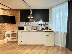 Kuchyňa alebo kuchynka v ubytovaní Petite Viste No. 3 Apartment