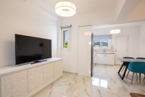 TV a/nebo společenská místnost v ubytování Punta Mare Homes