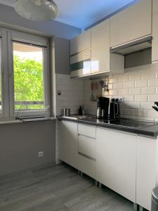 Kuchyňa alebo kuchynka v ubytovaní Marias Apartment