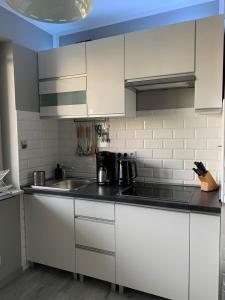 Kuchyňa alebo kuchynka v ubytovaní Marias Apartment