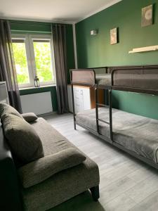 Posteľ alebo postele v izbe v ubytovaní Marias Apartment