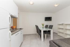Kuchyňa alebo kuchynka v ubytovaní Apartments M&A