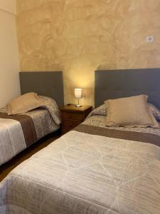 A bed or beds in a room at Apartamento La Herradura