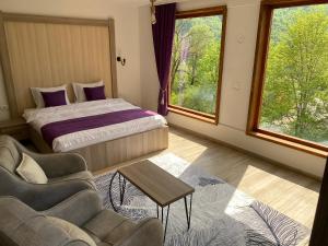 Postel nebo postele na pokoji v ubytování Chalet Kujta