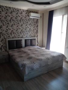 Postel nebo postele na pokoji v ubytování Guest house UTA