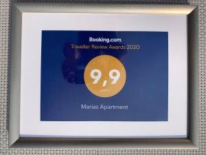 Certifikát, ocenenie alebo iný dokument vystavený v ubytovaní Marias Apartment