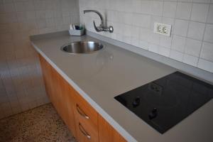 Una cocina o zona de cocina en Apartamentos Mayagüez - Adults Only