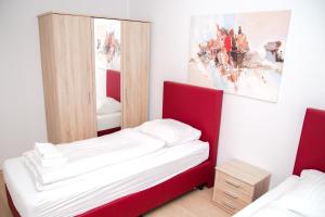 Ένα ή περισσότερα κρεβάτια σε δωμάτιο στο Othman Appartements Anderter Straße 55g