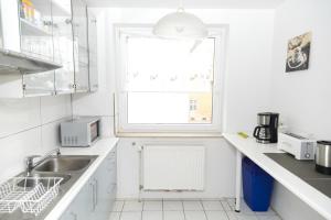 Η κουζίνα ή μικρή κουζίνα στο Othman Appartements Anderter Straße 55g