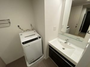 Koupelna v ubytování HOTEL LiVEMAX PREMIUM Nagoya Marunouchi + 30 fotografií