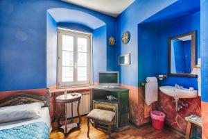 TV a/nebo společenská místnost v ubytování Hotel Portacavana