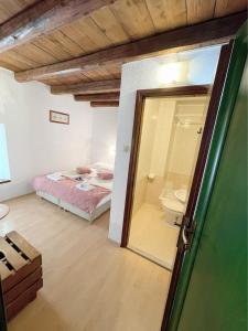 Postel nebo postele na pokoji v ubytování House Ivančić-free parking