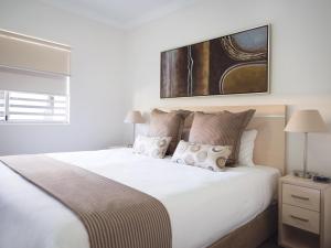 Ένα ή περισσότερα κρεβάτια σε δωμάτιο στο Oaks Brisbane Mews Suites +21 φωτογραφίες
