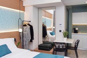 Posteľ alebo postele v izbe v ubytovaní 7Rizes Luxury Living