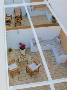 a view of the patio from the top of a house at Suncourt Lux Rooms in Laganas