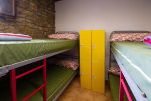 Postel nebo postele na pokoji v ubytování La Pata de Oca Hostal Rural y Albergue