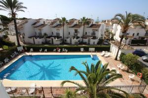 The swimming pool at or close to 2 Mijas Playa Club in La Cala de Mijas