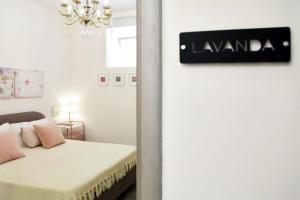 Postel nebo postele na pokoji v ubytování B&B RONCO ZAFFARANA
