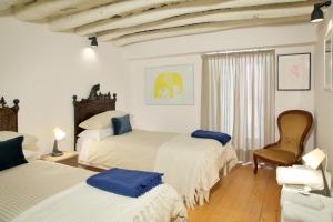 Llit o llits en una habitació de B&B RONCO ZAFFARANA