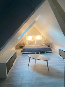 Postel nebo postele na pokoji v ubytování Appartement charmant - Férel - 60 m² - Terrasse privative