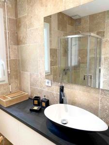 Koupelna v ubytování Appartement charmant - Férel - 60 m² - Terrasse privative