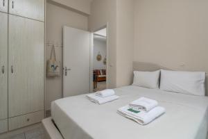 Ένα ή περισσότερα κρεβάτια σε δωμάτιο στο Vira Vivere Houses
