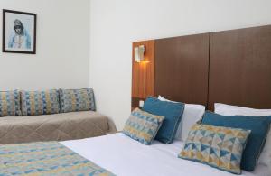 Postel nebo postele na pokoji v ubytování El Mehdi Beach Resort ex Primasol El Mehdi