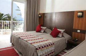 Postel nebo postele na pokoji v ubytování El Mehdi Beach Resort ex Primasol El Mehdi