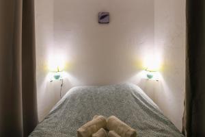 Posteľ alebo postele v izbe v ubytovaní Le Westy, terrasse, climatisation, chambre
