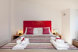 A bed or beds in a room at Lo Speziale - Corbezzolo