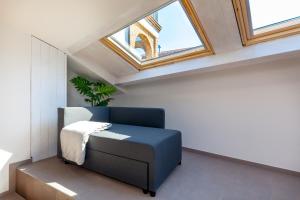 A bed or beds in a room at Lo Speziale - Corbezzolo