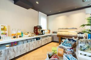 a kitchen with a counter with food on it at B&B Isabella in Milano Marittima