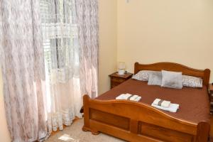 Ένα ή περισσότερα κρεβάτια σε δωμάτιο στο Apartments Simun
