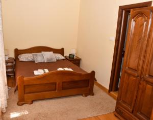 Ένα ή περισσότερα κρεβάτια σε δωμάτιο στο Apartments Simun