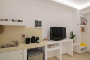 Kuchyňa alebo kuchynka v ubytovaní Suncourt Lux Rooms
