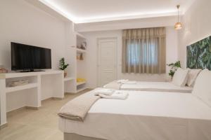 Posteľ alebo postele v izbe v ubytovaní Suncourt Lux Rooms