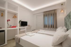 Posteľ alebo postele v izbe v ubytovaní Suncourt Lux Rooms