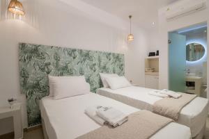 Posteľ alebo postele v izbe v ubytovaní Suncourt Lux Rooms