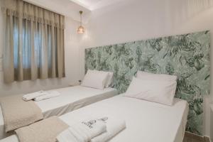 Posteľ alebo postele v izbe v ubytovaní Suncourt Lux Rooms
