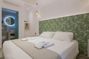Posteľ alebo postele v izbe v ubytovaní Suncourt Lux Rooms