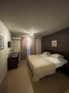 Postel nebo postele na pokoji v ubytování Hotel Prélude + 37 fotografií