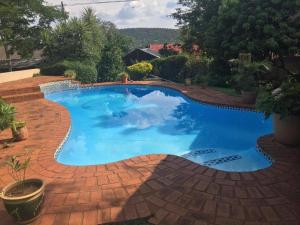 Bazén v ubytování Meraki Upmarket Guesthouse nebo v jeho okolí
