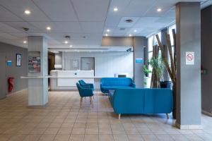 Posezení v ubytování CYAN HOTEL - Roissy Villepinte Parc des Expositions