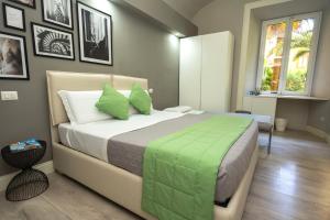 A bed or beds in a room at Scipioni Best Rooms