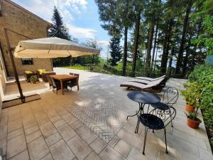 A garden outside BELLA TUSCANY - Residence