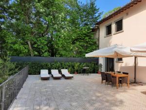 A patio or other outdoor area at BELLA TUSCANY - Residence