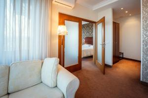 Posteľ alebo postele v izbe v ubytovaní Hotel Kuracyjny Spa & Wellness