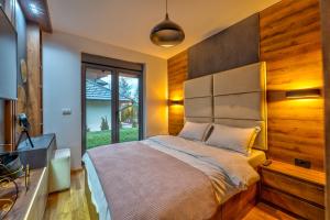 Postel nebo postele na pokoji v ubytování Andrijana Home