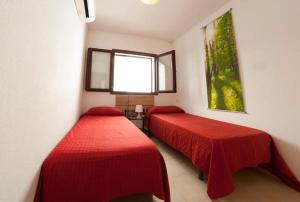 Łóżko lub łóżka w pokoju w obiekcie Casa de 5 habitaciones en Cala D'or