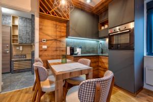 Kuchyň nebo kuchyňský kout v ubytování Andrijana Home + 32 fotografií